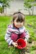 Girl of three years old with berries