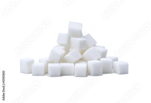 Photo: pile of refined white sugar cubes pile of refined white sugar cubes