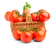 Photo: Wicker basket full of delicious tomatoes Wicker basket full of delicious tomatoes