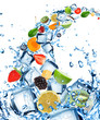Photo: Fresh fruit in water splash with ice cubes Fresh fruit in water splash with ice cubes