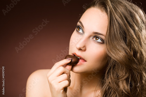 Photo: Chocolate loving brunette beauty Chocolate loving brunette beauty