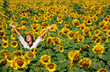 Girl in sunflowers