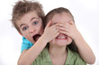 Children playing peek-a-boo