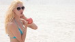 women eat red apple