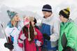 Family On Ski Holiday In Mountains
