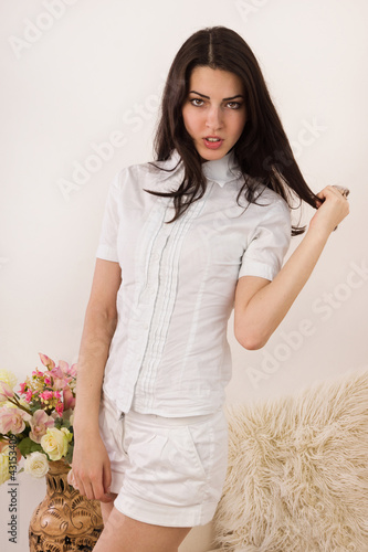 Photo: Attractive young woman in a boudoir Attractive young woman in a boudoir