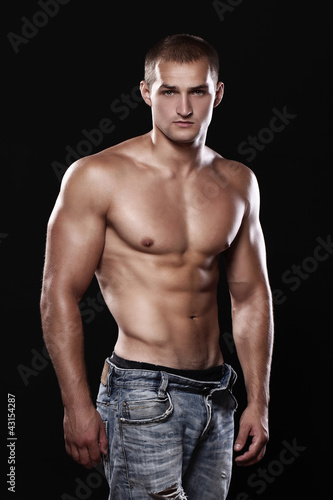 Photo: Young and sexy guy wearing jeans Young and sexy guy wearing jeans