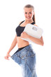 Photo: Woman wearing old jeans after weight loss Woman wearing old jeans after weight loss