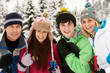 Family On Ski Holiday In Mountains