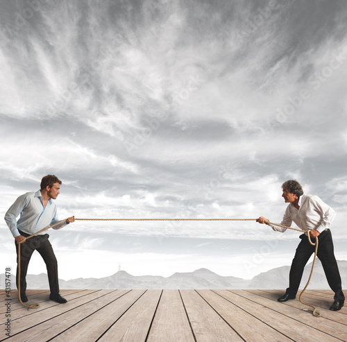 Foto: Businessman and rope challenge Businessman and rope challenge