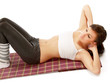 A young woman doing exercises