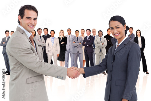 Photo: Business people shaking hands Business people shaking hands