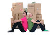 young people and cardboard boxes