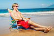 Young Man Relaxing at the Beach