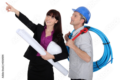 Photo: Female architect and builder Female architect and builder