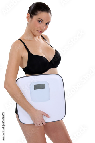Photo: Woman with a pair of scales Woman with a pair of scales