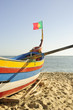 Typical portuguese fishing boat on the beach, Espinho, Portugal