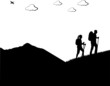 Mountain climbing, hiking couple with rucksacks silhouette