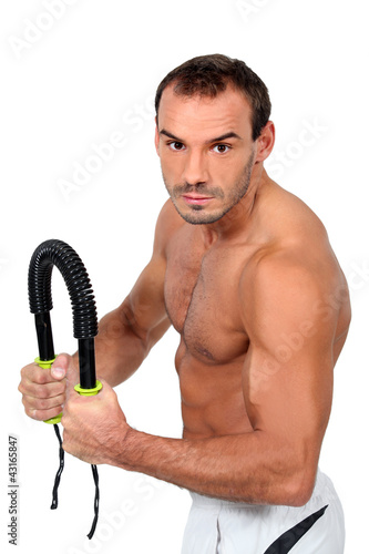 Photo: Man bending a bar Man bending a bar