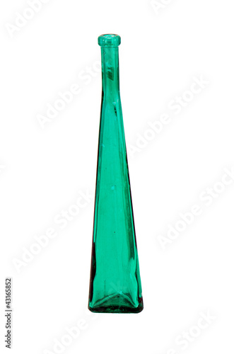 Foto: Tall green glass vintage bottle isolated on white Tall green glass vintage bottle isolated on white
