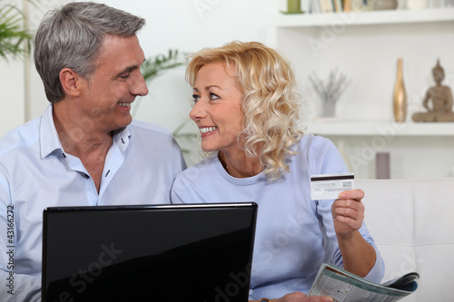 Photo: Couple shopping online Couple shopping online