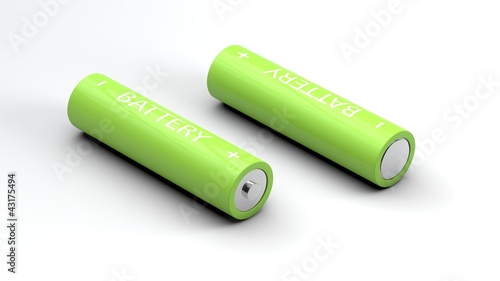 Photo: two green batteries two green batteries