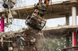 Demolition of a building with concrete floors and pillars