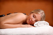 Portrait of young beautiful woman in spa environment.