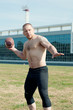 American football player just about to pass the ball