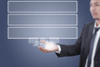 Businessman holding Button on the whiteboard.