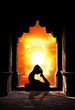Yoga silhouette in temple