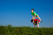 Girl and boy running, jumping outdoor