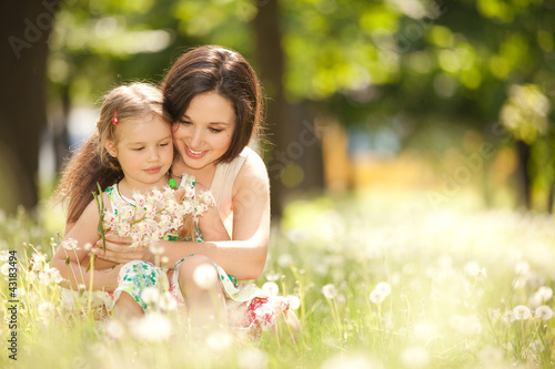 Photo: Mother and daughter in the park Mother and daughter in the park