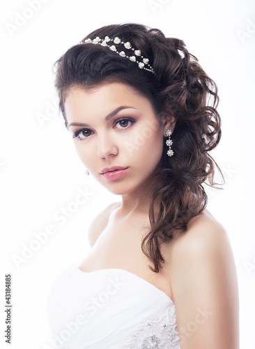 Photo: Portrait of beautiful young bride - isolated on white background Portrait of beautiful young bride - isolated on white background