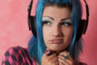 Punk girl DJ with dyed turqouise hair
