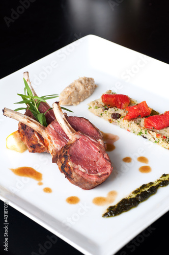 Photo: Australian lamb roasted with herbs , couscous and mutabbel Australian lamb roasted with herbs , couscous and mutabbel