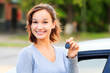 Happy girl with a car key