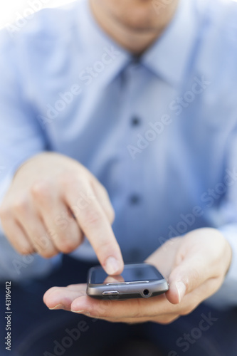 Photo: Man with smartphone Man with smartphone