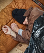 Homeless Man Sleeping in the Street