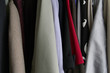 Photo: Hanging clothing background. Hanging clothing background.