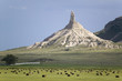 Photo: Hay bails in front of Chimney Rock National Historic Site, Nebraska, the most famous site on the Oregon Trail for early settlers and pioneers Hay bails in front of Chimney Rock National Historic Site, Nebraska, the most famous site on the Oregon Trail for early settlers and pioneers
