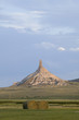 Photo: Hay bails in front of Chimney Rock National Historic Site, Nebraska, the most famous site on the Oregon Trail for early settlers and pioneers Hay bails in front of Chimney Rock National Historic Site, Nebraska, the most famous site on the Oregon Trail for early settlers and pioneers