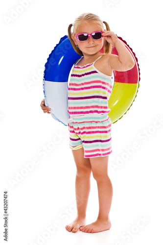 Photo: little girl with sunglasses and inflatable ring little girl with sunglasses and inflatable ring