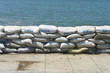 Photo: a wall of sandbags a wall of sandbags