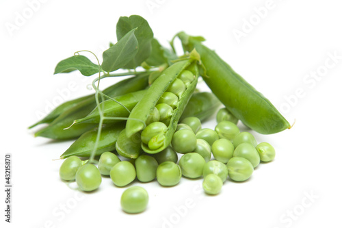 Photo: green peas on a white background green peas on a white background