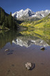 Photo: Autumn colors of Aspens reflecting in lake under Maroon Bells, Colorado, near Aspen Autumn colors of Aspens reflecting in lake under Maroon Bells, Colorado, near Aspen