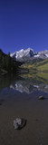 Photo: Panoramic view of autumn colors of Aspens reflecting in lake under Maroon Bells, Colorado, near Aspen Panoramic view of autumn colors of Aspens reflecting in lake under Maroon Bells, Colorado, near Aspen