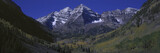 Photo: Panoramic view of autumn colors of Aspens reflecting in lake under Maroon Bells, Colorado, near Aspen Panoramic view of autumn colors of Aspens reflecting in lake under Maroon Bells, Colorado, near Aspen