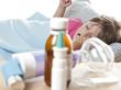 little girl sleaping in the bed and drugs, inhaler