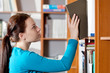 girl in library